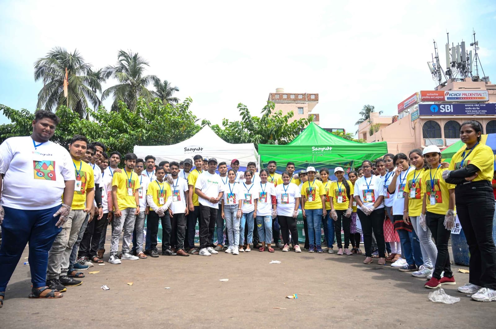 Sanyukt volunteers gathered together for a community clean-up
